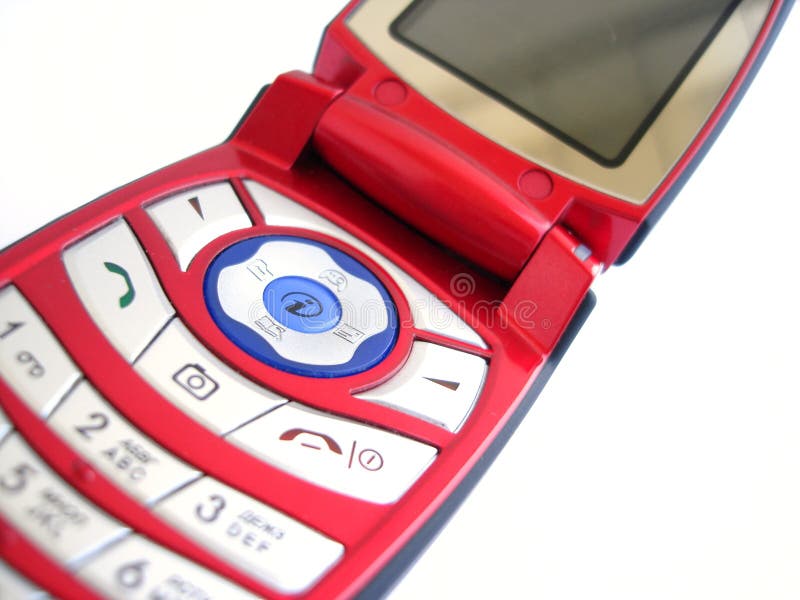 Telefono mobile rosso sopra una priorità bassa bianca fotografia stock Telefono mobile rosso sopra una priorità bassa bianca fotografia stock