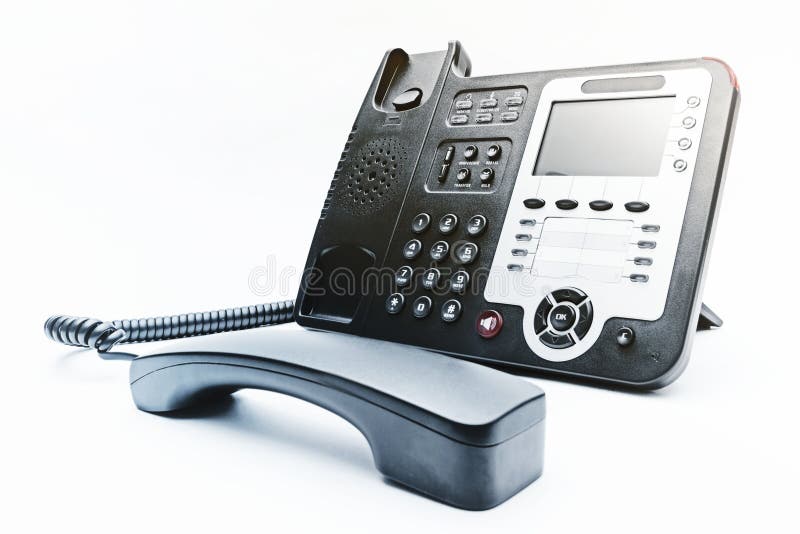 Telefono nero su priorità bassa bianca immagini stock