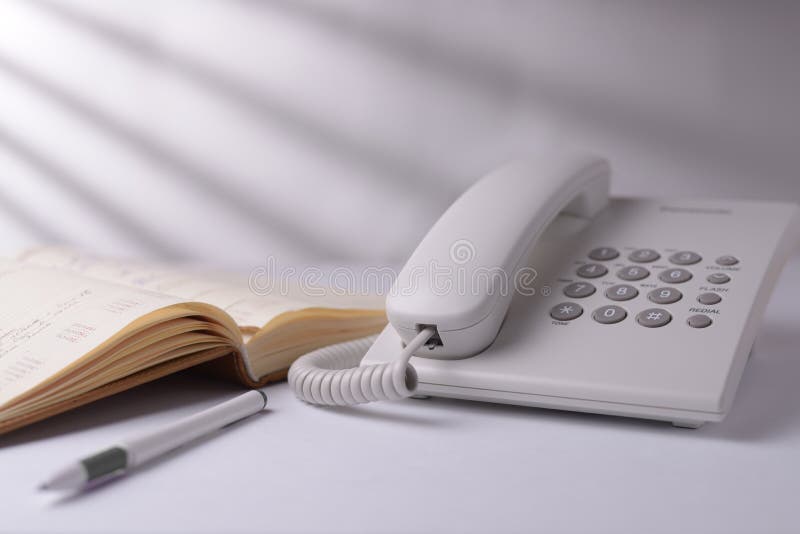 Telephone with open book