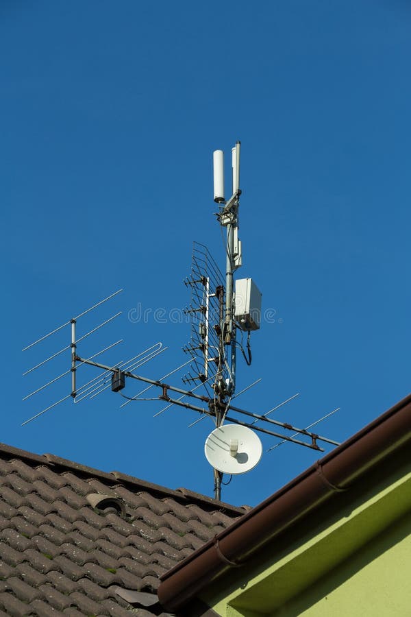 Television Antenna and Wifi Transmitter Stock Photo Image of roof