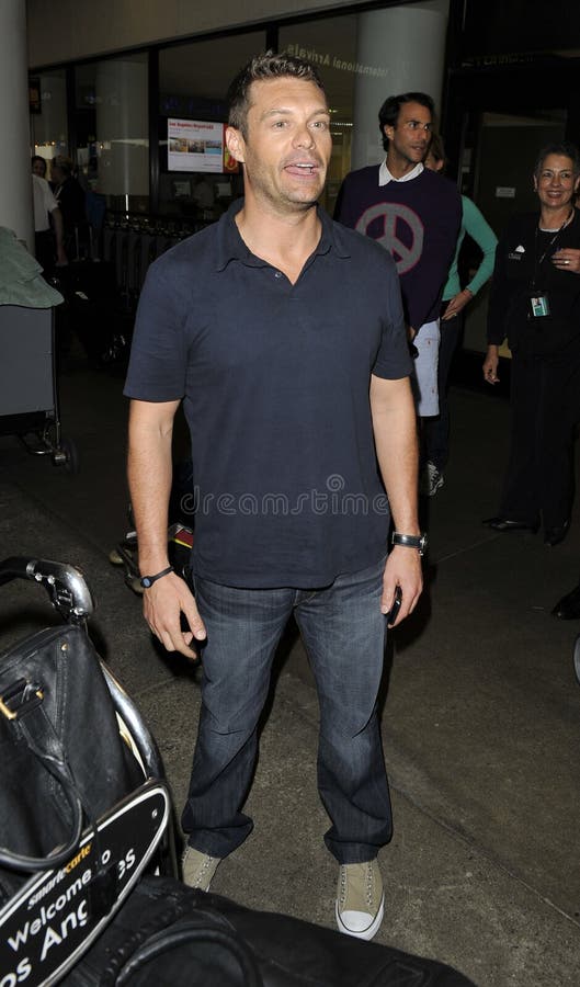 LOS ANGELES-JULY 14: Television/radio presenter Ryan Seacrest at LAX. July 14th in Los Angeles, California 2010