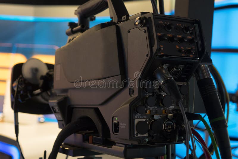 Television studio with camera and lights - recording TV show. Shallow depth of field stock image Television studio with camera and lights - recording TV show. Shallow depth of field stock image