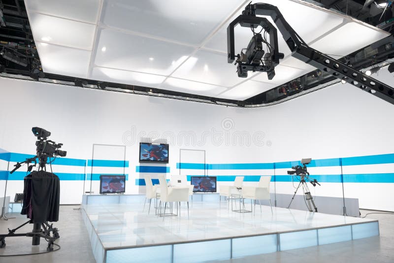 Television studio with jib camera and lights