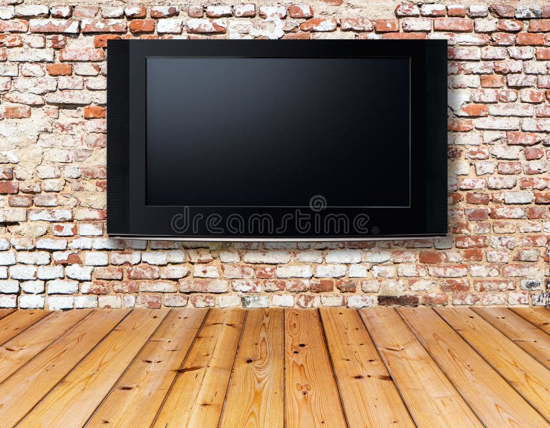 Televisore su una vecchia parete immagini stock Televisore su una vecchia parete immagini stock