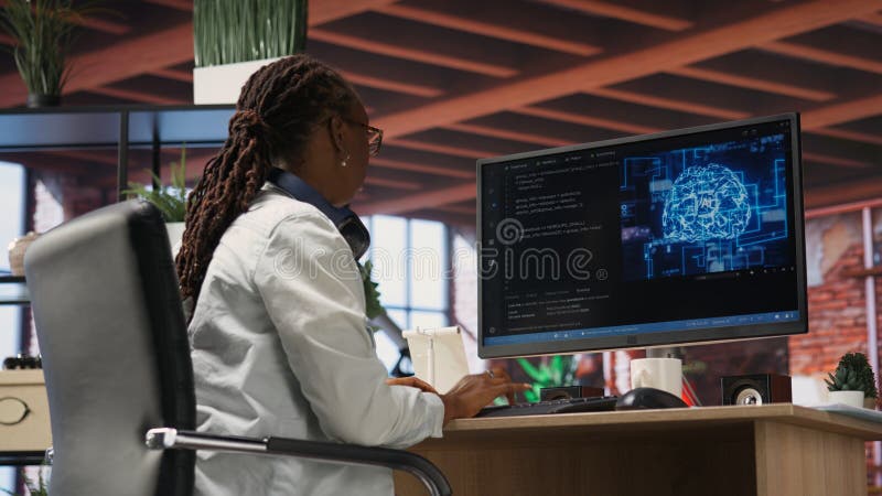 Teleworking programmer using computer for artificial intelligence computing royalty free stock image