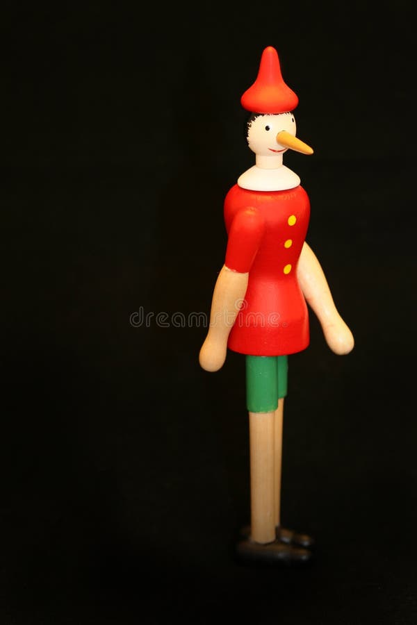 Wooden puppet with long nose. Little marionette stock images, royalty-free photos and pictures