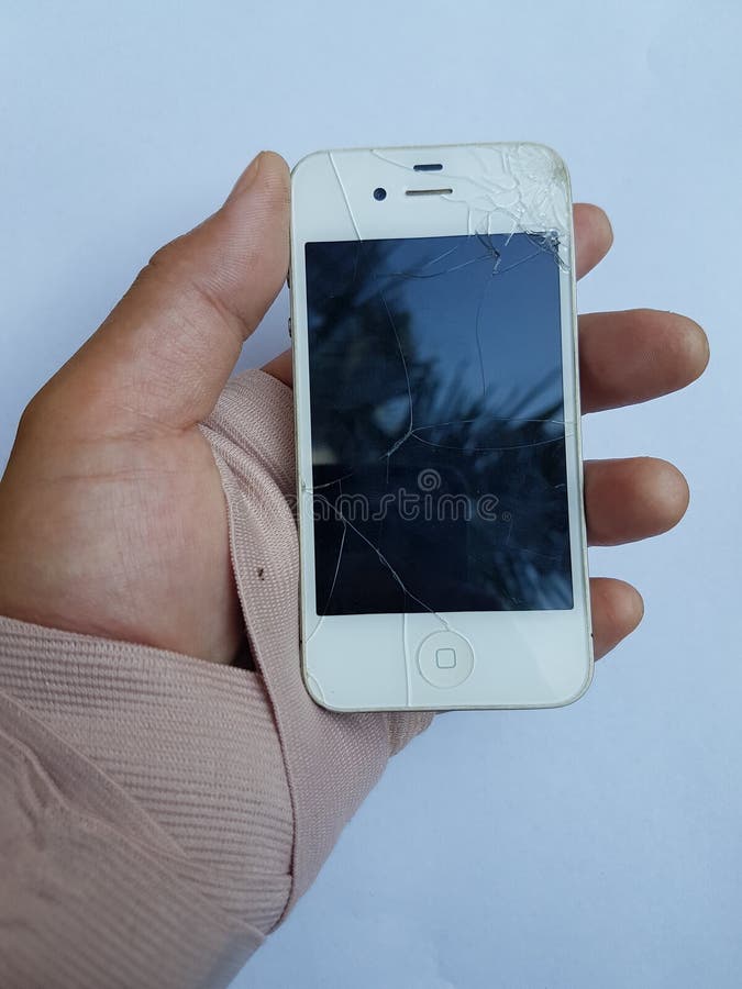TELÉFONO QUEBRADO DE LA MANO foto de archivo libre de regalías TELÉFONO QUEBRADO DE LA MANO foto de archivo libre de regalías