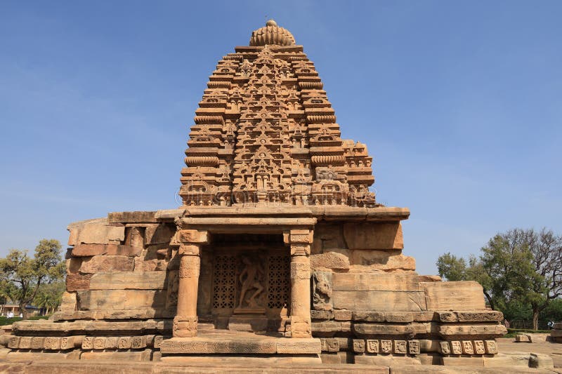 Pattadakal, also called Raktapura, is a complex of 7th and 8th century CE Hindu and Jain temples in northern Karnataka, India. Located on the west bank of the Malaprabha River in Bagalkot district, this UNESCO World Heritage Site[1][2] is 23 kilometres (14 mi) from Badami and about 9.7 kilometres (6 mi) from Aihole, both of which are historically significant centres of Chalukya monuments.[3][4] The monument is a protected site under Indian law and is managed by the Archaeological Survey of India. Pattadakal, also called Raktapura, is a complex of 7th and 8th century CE Hindu and Jain temples in northern Karnataka, India. Located on the west bank of the Malaprabha River in Bagalkot district, this UNESCO World Heritage Site[1][2] is 23 kilometres (14 mi) from Badami and about 9.7 kilometres (6 mi) from Aihole, both of which are historically significant centres of Chalukya monuments.[3][4] The monument is a protected site under Indian law and is managed by the Archaeological Survey of India