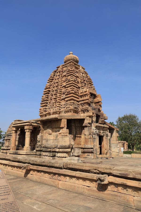 Pattadakal, also called Raktapura, is a complex of 7th and 8th century CE Hindu and Jain temples in northern Karnataka, India. Located on the west bank of the Malaprabha River in Bagalkot district, this UNESCO World Heritage Site[1][2] is 23 kilometres (14 mi) from Badami and about 9.7 kilometres (6 mi) from Aihole, both of which are historically significant centres of Chalukya monuments.[3][4] The monument is a protected site under Indian law and is managed by the Archaeological Survey of India. Pattadakal, also called Raktapura, is a complex of 7th and 8th century CE Hindu and Jain temples in northern Karnataka, India. Located on the west bank of the Malaprabha River in Bagalkot district, this UNESCO World Heritage Site[1][2] is 23 kilometres (14 mi) from Badami and about 9.7 kilometres (6 mi) from Aihole, both of which are historically significant centres of Chalukya monuments.[3][4] The monument is a protected site under Indian law and is managed by the Archaeological Survey of India