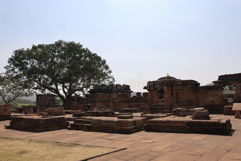 Pattadakal, also called Raktapura, is a complex of 7th and 8th century CE Hindu and Jain temples in northern Karnataka, India. Located on the west bank of the Malaprabha River in Bagalkot district, this UNESCO World Heritage Site[1][2] is 23 kilometres (14 mi) from Badami and about 9.7 kilometres (6 mi) from Aihole, both of which are historically significant centres of Chalukya monuments.[3][4] The monument is a protected site under Indian law and is managed by the Archaeological Survey of India. Pattadakal, also called Raktapura, is a complex of 7th and 8th century CE Hindu and Jain temples in northern Karnataka, India. Located on the west bank of the Malaprabha River in Bagalkot district, this UNESCO World Heritage Site[1][2] is 23 kilometres (14 mi) from Badami and about 9.7 kilometres (6 mi) from Aihole, both of which are historically significant centres of Chalukya monuments.[3][4] The monument is a protected site under Indian law and is managed by the Archaeological Survey of India