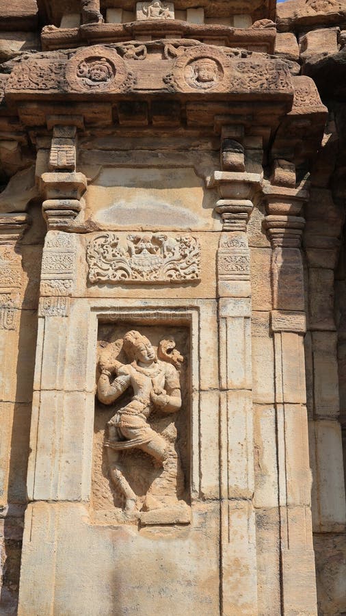 Pattadakal, also called Raktapura, is a complex of 7th and 8th century CE Hindu and Jain temples in northern Karnataka, India. Located on the west bank of the Malaprabha River in Bagalkot district, this UNESCO World Heritage Site[1][2] is 23 kilometres (14 mi) from Badami and about 9.7 kilometres (6 mi) from Aihole, both of which are historically significant centres of Chalukya monuments.[3][4] The monument is a protected site under Indian law and is managed by the Archaeological Survey of India. Pattadakal, also called Raktapura, is a complex of 7th and 8th century CE Hindu and Jain temples in northern Karnataka, India. Located on the west bank of the Malaprabha River in Bagalkot district, this UNESCO World Heritage Site[1][2] is 23 kilometres (14 mi) from Badami and about 9.7 kilometres (6 mi) from Aihole, both of which are historically significant centres of Chalukya monuments.[3][4] The monument is a protected site under Indian law and is managed by the Archaeological Survey of India