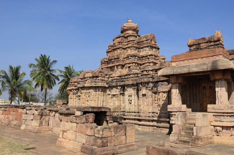 Pattadakal, also called Raktapura, is a complex of 7th and 8th century CE Hindu and Jain temples in northern Karnataka, India. Located on the west bank of the Malaprabha River in Bagalkot district, this UNESCO World Heritage Site[1][2] is 23 kilometres (14 mi) from Badami and about 9.7 kilometres (6 mi) from Aihole, both of which are historically significant centres of Chalukya monuments.[3][4] The monument is a protected site under Indian law and is managed by the Archaeological Survey of India. Pattadakal, also called Raktapura, is a complex of 7th and 8th century CE Hindu and Jain temples in northern Karnataka, India. Located on the west bank of the Malaprabha River in Bagalkot district, this UNESCO World Heritage Site[1][2] is 23 kilometres (14 mi) from Badami and about 9.7 kilometres (6 mi) from Aihole, both of which are historically significant centres of Chalukya monuments.[3][4] The monument is a protected site under Indian law and is managed by the Archaeological Survey of India