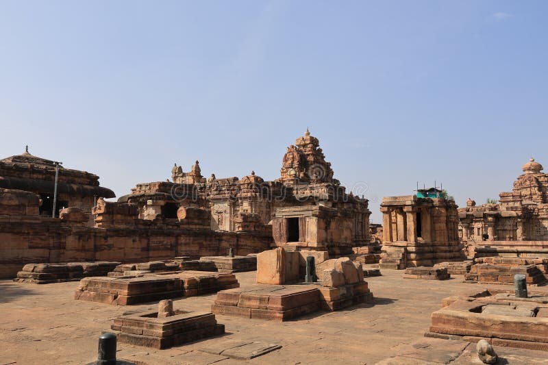 Pattadakal, also called Raktapura, is a complex of 7th and 8th century CE Hindu and Jain temples in northern Karnataka, India. Located on the west bank of the Malaprabha River in Bagalkot district, this UNESCO World Heritage Site[1][2] is 23 kilometres (14 mi) from Badami and about 9.7 kilometres (6 mi) from Aihole, both of which are historically significant centres of Chalukya monuments.[3][4] The monument is a protected site under Indian law and is managed by the Archaeological Survey of India. Pattadakal, also called Raktapura, is a complex of 7th and 8th century CE Hindu and Jain temples in northern Karnataka, India. Located on the west bank of the Malaprabha River in Bagalkot district, this UNESCO World Heritage Site[1][2] is 23 kilometres (14 mi) from Badami and about 9.7 kilometres (6 mi) from Aihole, both of which are historically significant centres of Chalukya monuments.[3][4] The monument is a protected site under Indian law and is managed by the Archaeological Survey of India