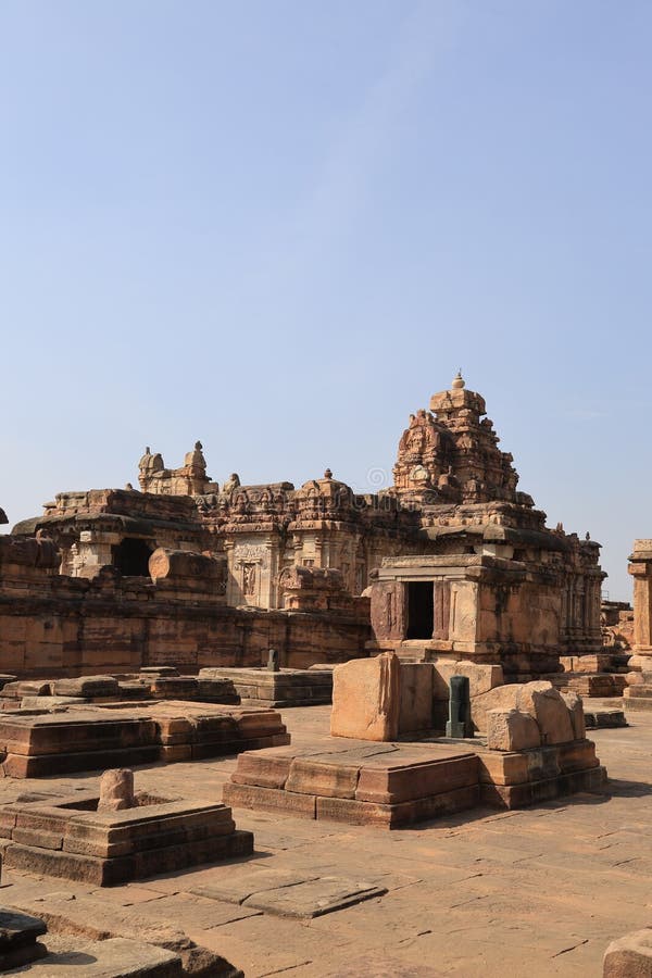 Pattadakal, also called Raktapura, is a complex of 7th and 8th century CE Hindu and Jain temples in northern Karnataka, India. Located on the west bank of the Malaprabha River in Bagalkot district, this UNESCO World Heritage Site[1][2] is 23 kilometres (14 mi) from Badami and about 9.7 kilometres (6 mi) from Aihole, both of which are historically significant centres of Chalukya monuments.[3][4] The monument is a protected site under Indian law and is managed by the Archaeological Survey of India. Pattadakal, also called Raktapura, is a complex of 7th and 8th century CE Hindu and Jain temples in northern Karnataka, India. Located on the west bank of the Malaprabha River in Bagalkot district, this UNESCO World Heritage Site[1][2] is 23 kilometres (14 mi) from Badami and about 9.7 kilometres (6 mi) from Aihole, both of which are historically significant centres of Chalukya monuments.[3][4] The monument is a protected site under Indian law and is managed by the Archaeological Survey of India