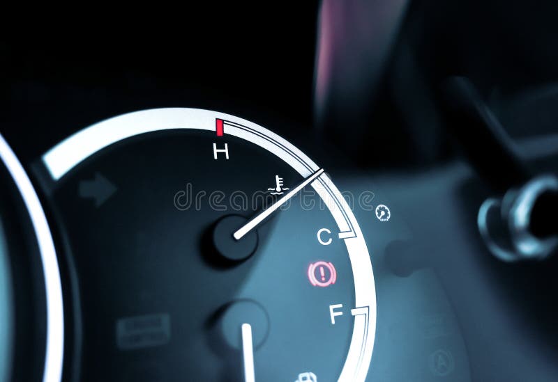 Temperature Gauge Indicator on Car Instrument Panel and Caution Light