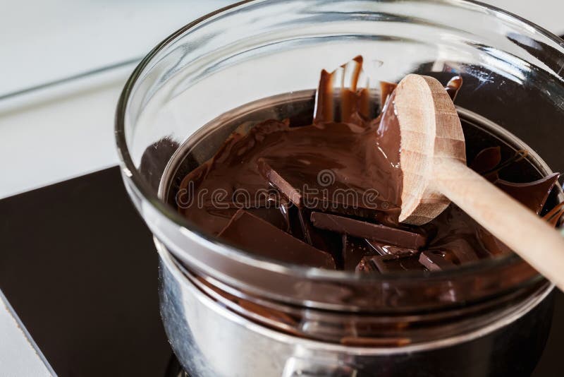 Tempering Chocolate stock image. Image of culinary, chocolate 65975121
