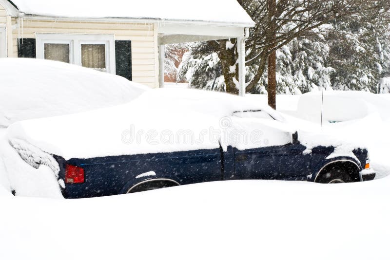 Snow storm that battered the area of Northern Virginia on February 5th and 6th of 2010 with this particular area being in Frederick County. Pickup truck buried under the snow. Snow storm that battered the area of Northern Virginia on February 5th and 6th of 2010 with this particular area being in Frederick County. Pickup truck buried under the snow.