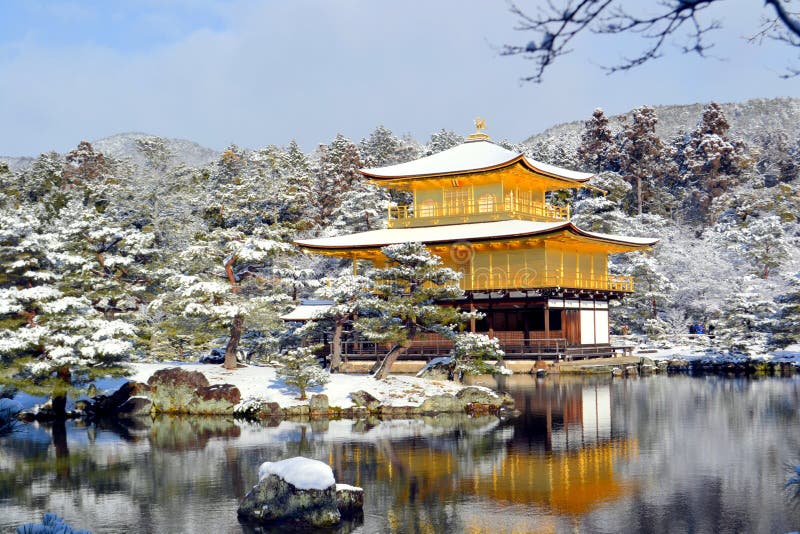 The photo was taken in a very beautiful snow day at Golden temple in Kyoto, Japan. The photo was taken in a very beautiful snow day at Golden temple in Kyoto, Japan