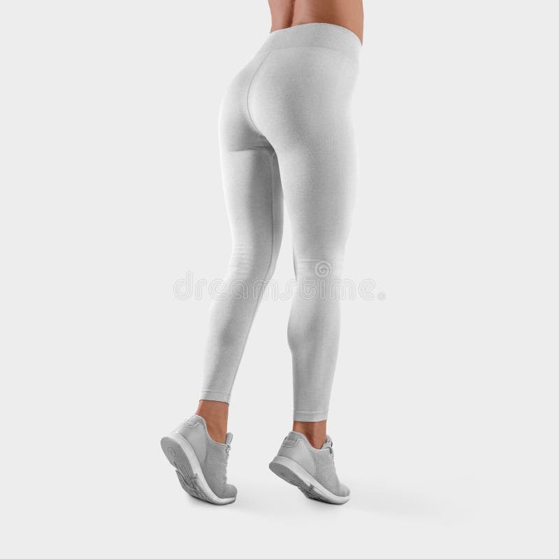 Template of white stretch leggings on a fit girl standing on toes in sneakers, women`s sports pants for design presentation, side