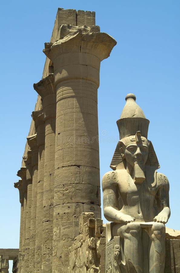 Columns and statue in the Temple of Luxor, Egypt. Columns and statue in the Temple of Luxor, Egypt.