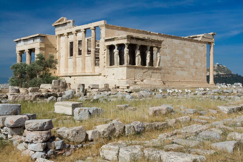 Ancient Temple Erechtheion and The Porch of the Caryatids in Acropolis Athens Greece on blue sky background. Ancient Temple Erechtheion and The Porch of the Caryatids in Acropolis Athens Greece on blue sky background