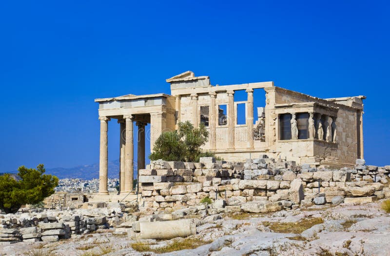 Erechtheum temple in Acropolis at Athens, Greece - travel background. Erechtheum temple in Acropolis at Athens, Greece - travel background