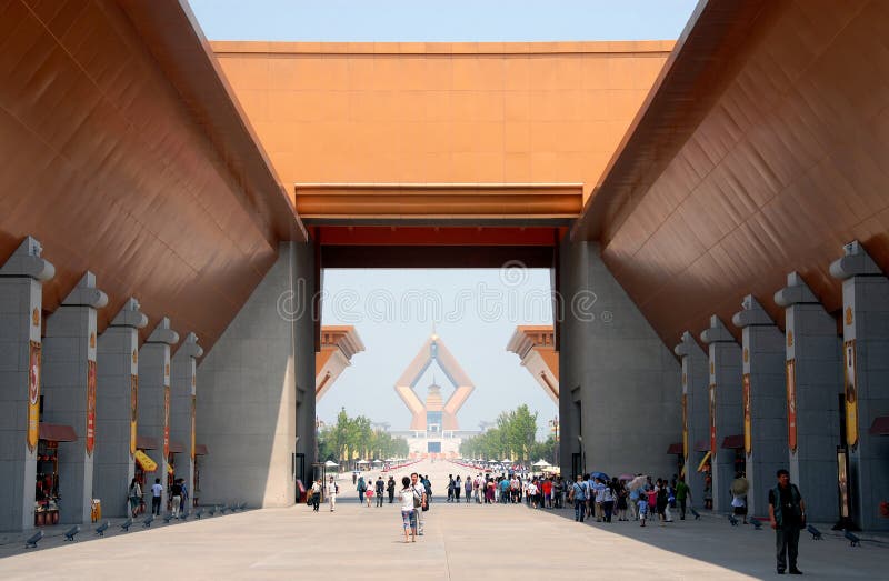 Famen Temple, Famen Town, Shaanxi Province, China: The entrance gate to the new complex at the Famen Temple with the huge diamond-shaped Namaste Dagoba in the distance. Famen Temple, Famen Town, Shaanxi Province, China: The entrance gate to the new complex at the Famen Temple with the huge diamond-shaped Namaste Dagoba in the distance.