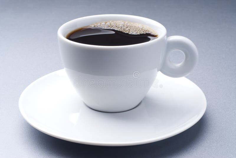 A ceramic cup full of black coffee. A ceramic cup full of black coffee