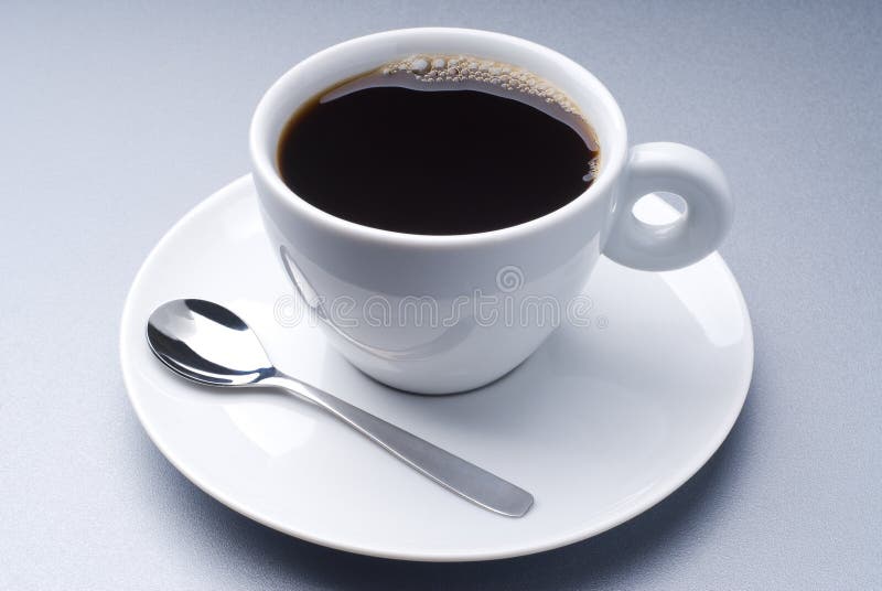 A ceramic cup full of black coffee. A ceramic cup full of black coffee