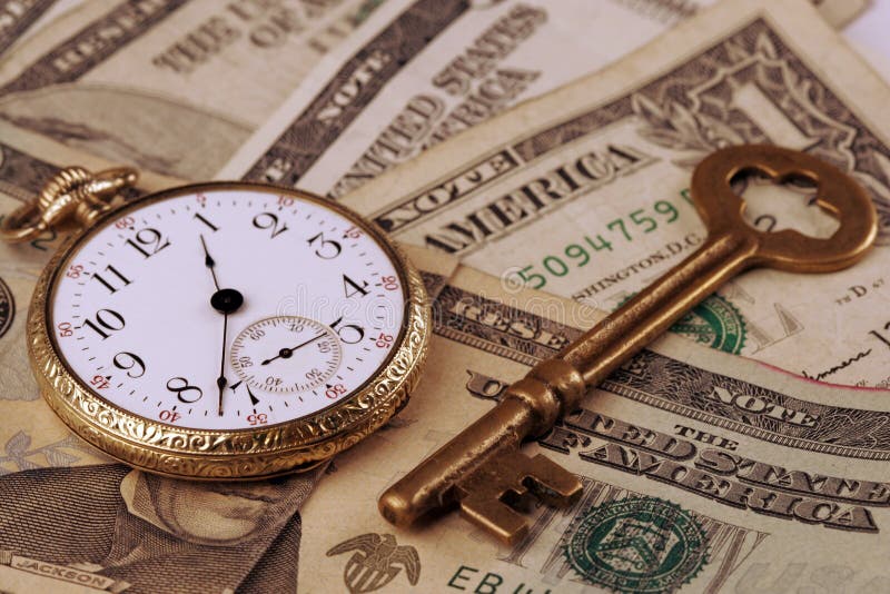 Conceptual keys to success of time and money. Rich colors and clear shot with skeleton key and an old pocketwatch. Conceptual keys to success of time and money. Rich colors and clear shot with skeleton key and an old pocketwatch.