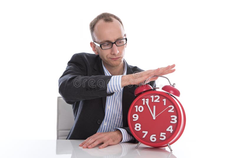Temps d'arrêt d'homme d'affaires sur l'horloge rouge d'isolement sur le backgro blanc photo stock Temps d'arrêt d'homme d'affaires sur l'horloge rouge d'isolement sur le backgro blanc photo stock