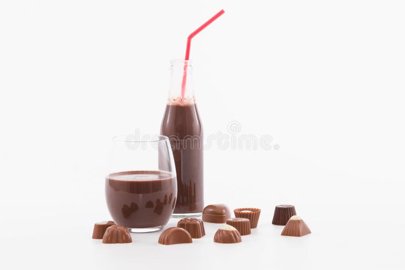 Tempting Glass and Bottle of Chocolate Milkshake with Assorted