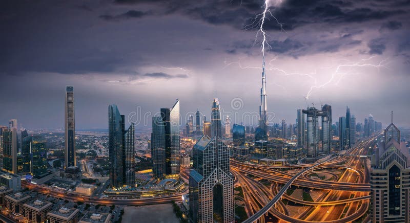 Dubai dramatic panoramic view lightning storm. Dubai is super modern city of UAE, cosmopolitan megalopolis. Dubai dramatic panoramic view lightning storm. Dubai is super modern city of UAE, cosmopolitan megalopolis.