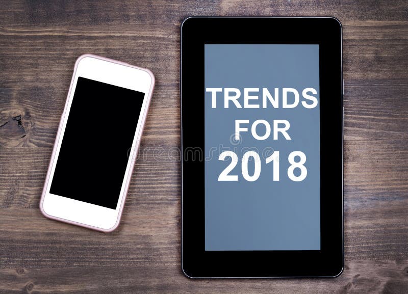 Tendensen voor 2018 Tekst op tabletapparaat stock foto Tendensen voor 2018 Tekst op tabletapparaat stock foto