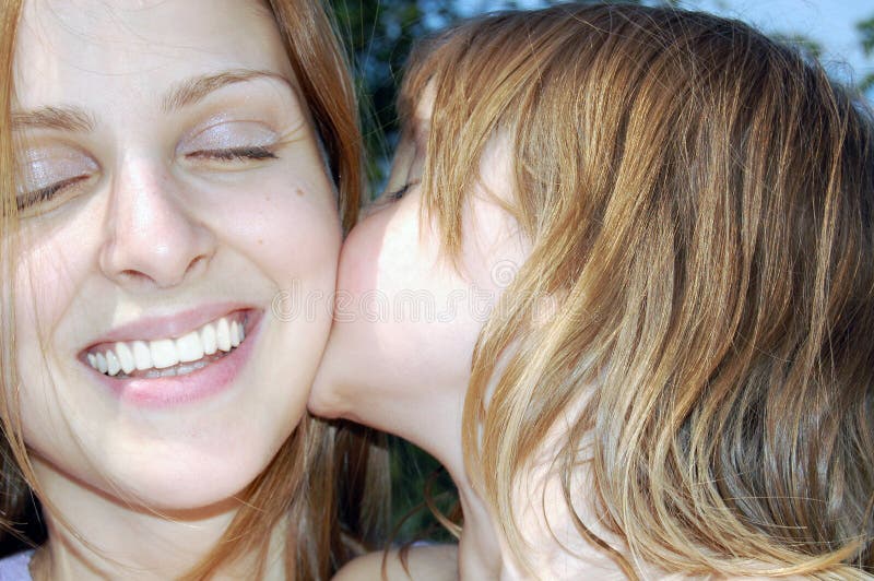 Tender kiss stock photo. Image of loving, kiss, eyes, girls 7514358