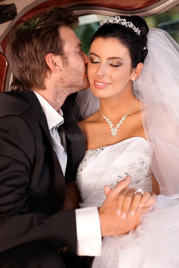 Tender kiss on weddingday stock photo. Image of elegant 28890800