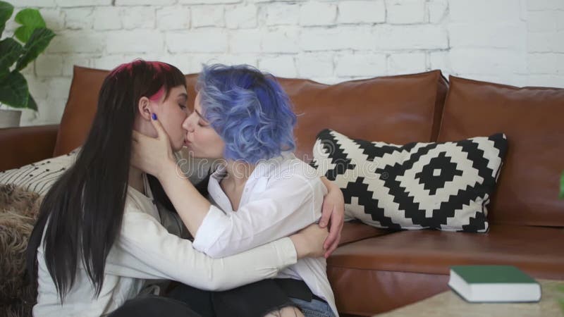 Tender Kiss between Young Lesbian Couple at Home. Long and Short Blue Hair. Woman Chilling Relaxing Stock Footage - Video of lesbian, kissing: 183197220