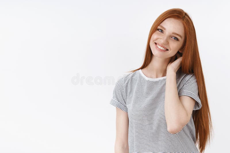 Tender modest flirty young cute redhead girl blue eyes tilting head touching neck cute silly smiling camera wearing