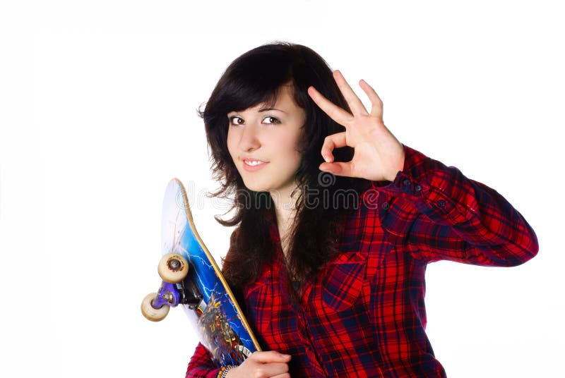 Portrait of teenage girl showing Ok. White background. Studio shot. Portrait of teenage girl showing Ok. White background. Studio shot.