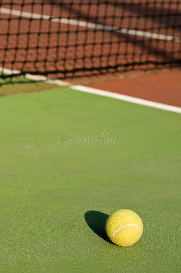 Tennis ball on court.