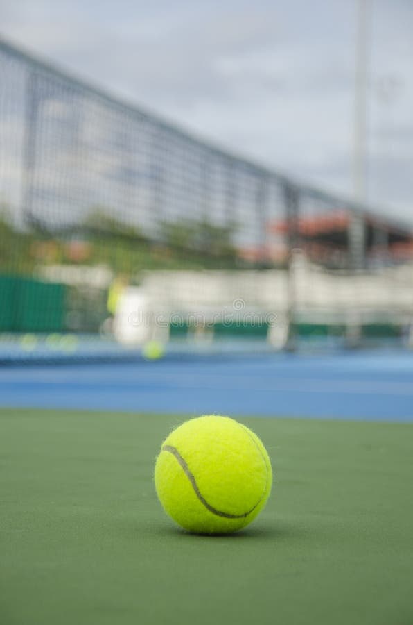 Tennis ball in court stock photo. Image of racket, court 42964282