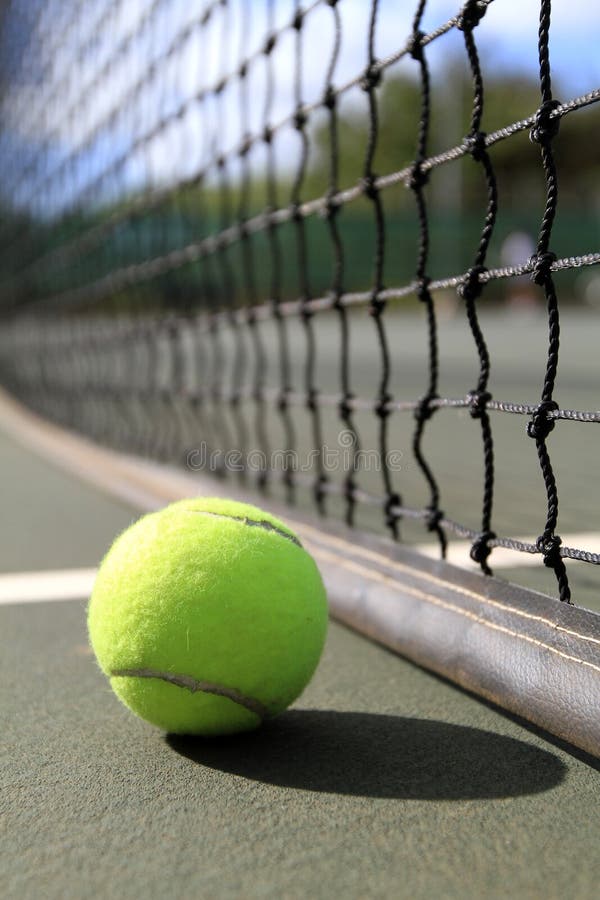 Tennis ball on the net stock image. Image of outdoors 30852335
