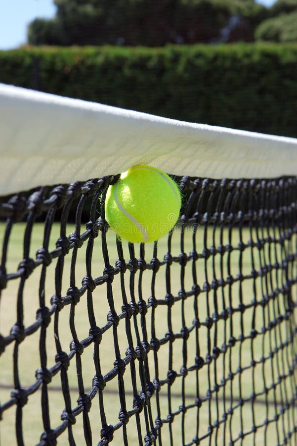 Tennis ball on the net stock image. Image of outdoors 30852335