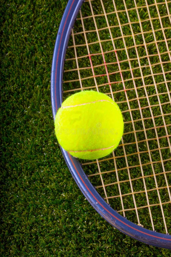 Tennis Ball and Racket Over Grass Stock Image Image of line, string