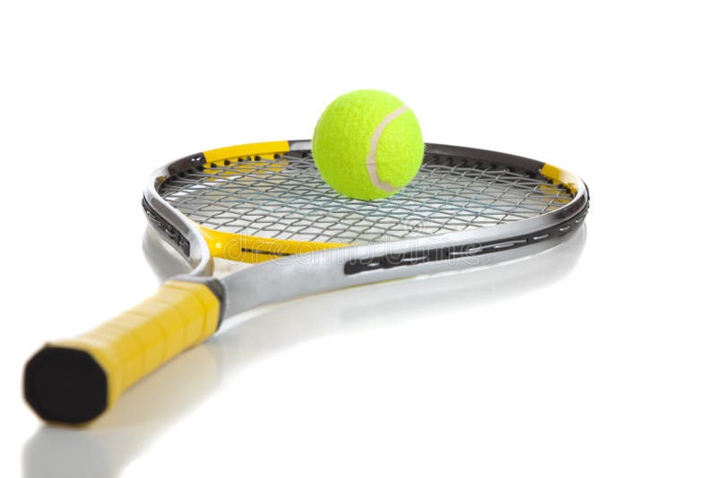 A tennis ball and racket on a white background with copy space. A tennis ball and racket on a white background with copy space