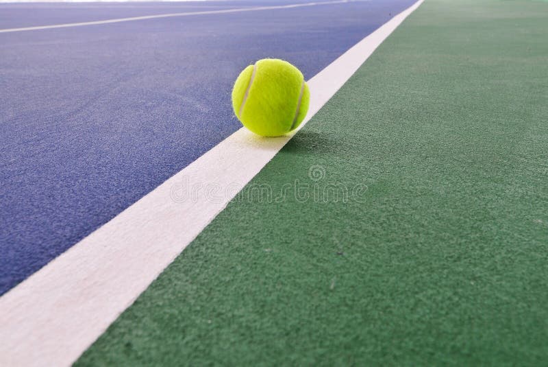 Tennis ball on the tennis court