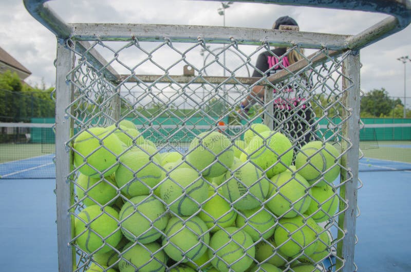 Tennis balls in the basket stock image. Image of objects 42964277