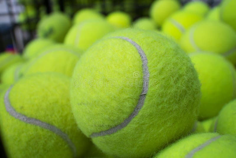 Tennis balls stock photo. Image of round, green, loads 43112384