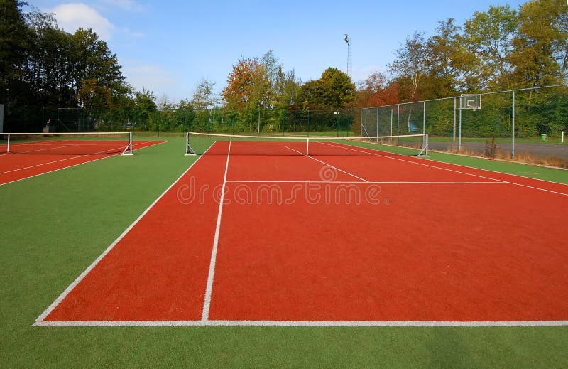 Tennis court under blue sky