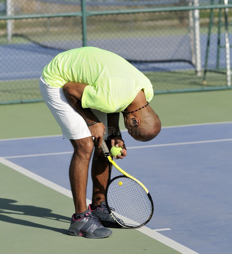 Tennis player lost in match. young man posing.